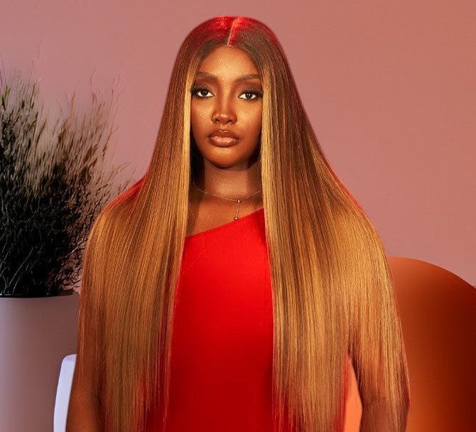Woman wearing a long straight human hair lace front wig